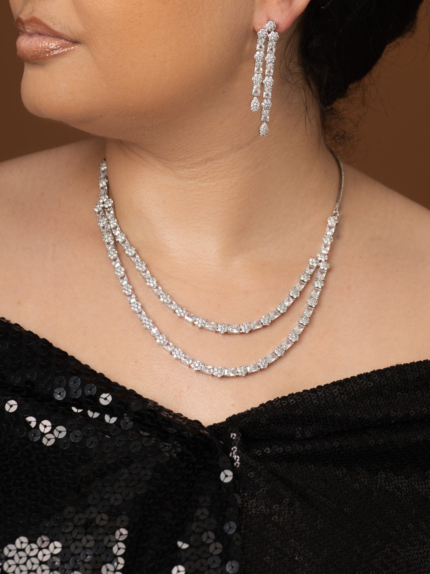 NAVYA Two Tier Cz Earring and Necklace set.