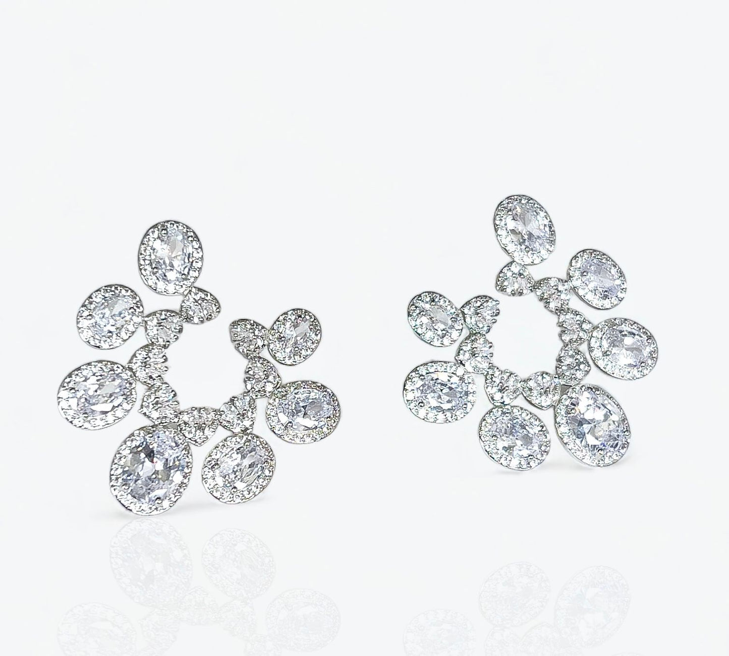 Luxia Large stud earrings .