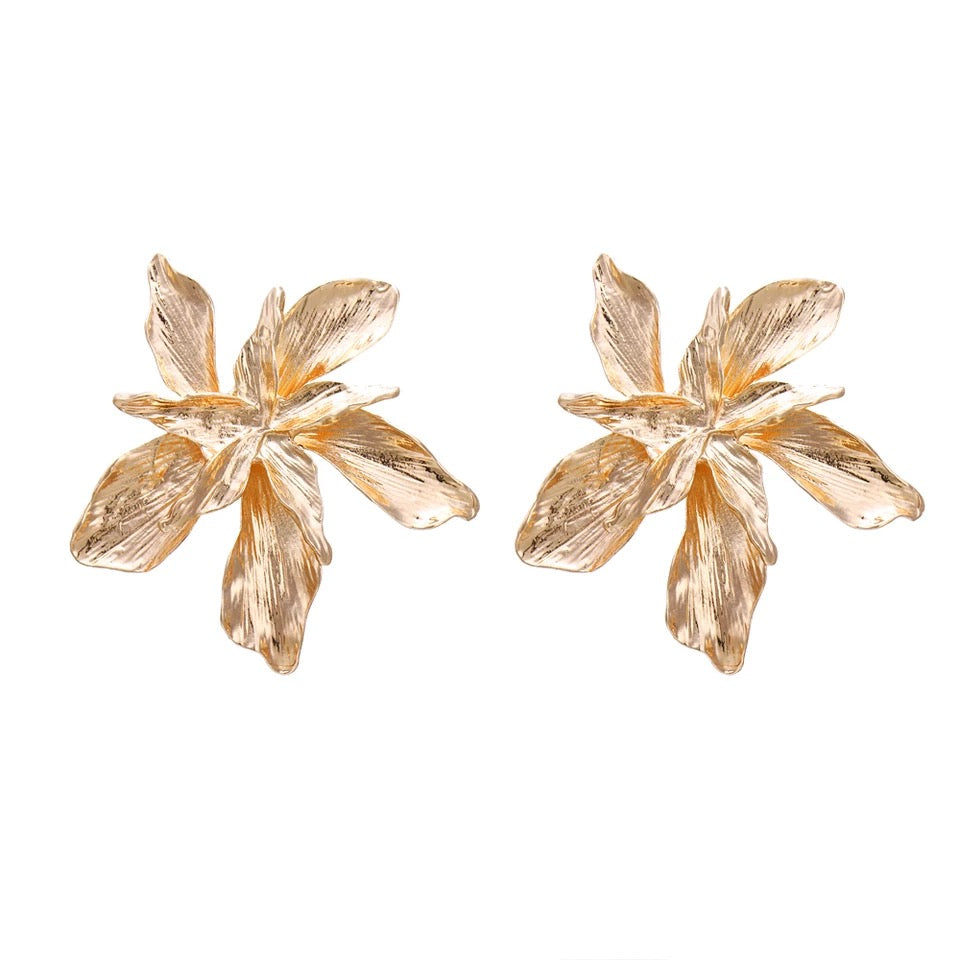 Fina Bold Metallic leaf earrings .